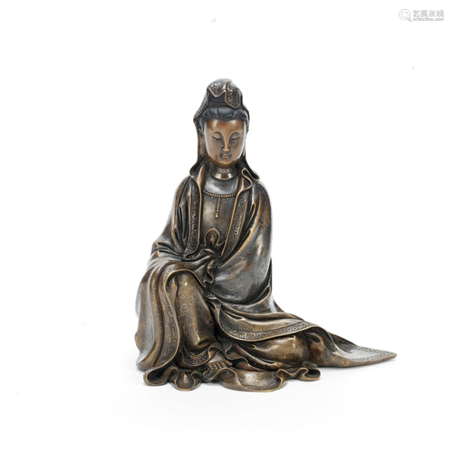 A SILVER WIRE-INLAID BRONZE FIGURE OF GUANYIN 19th/20th cent...