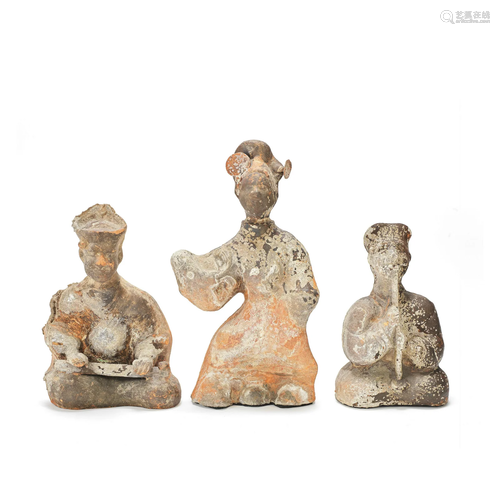 A GROUP OF THREE POTTERY MODELS OF MUSICIANS AND A DANCER Ha...