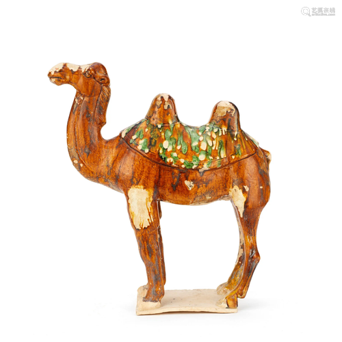 A SANCAI-GLAZED POTTERY CAMEL Tang Dynasty