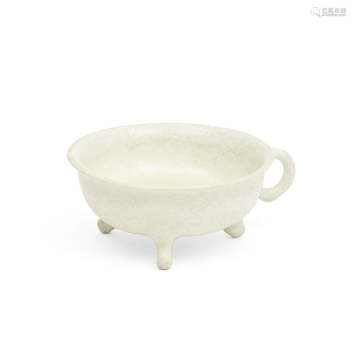 A CREAM GLAZED TRIPOD CUP Probably Tang Dynasty