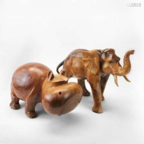 Eléphant et hippopotame, XXe s Bois sculpté, L 50 et 38 cm