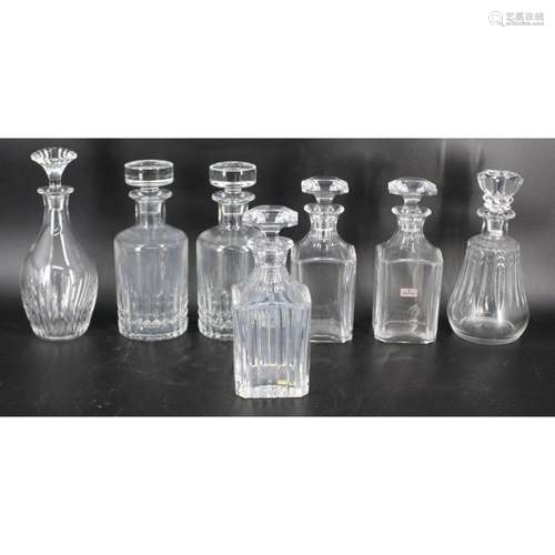 7 Baccarat Glass Lidded Decanters.