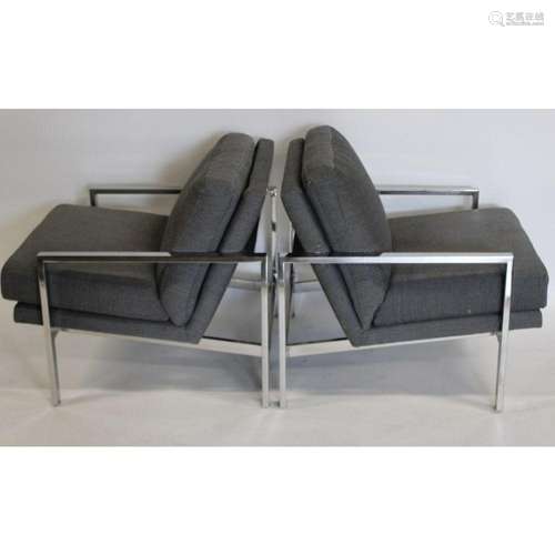 A Vintage Pair Of Upholstered Chrome Arm Chairs.