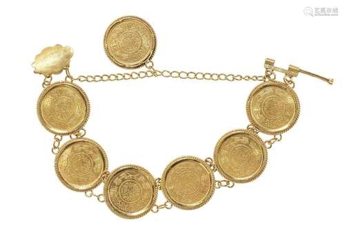 Bracelet composé de sept pièces d'or d'Arabie-Saoudi...