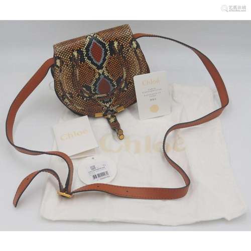 COUTURE. Chloe Marci Mini Round Crossbody Purse.