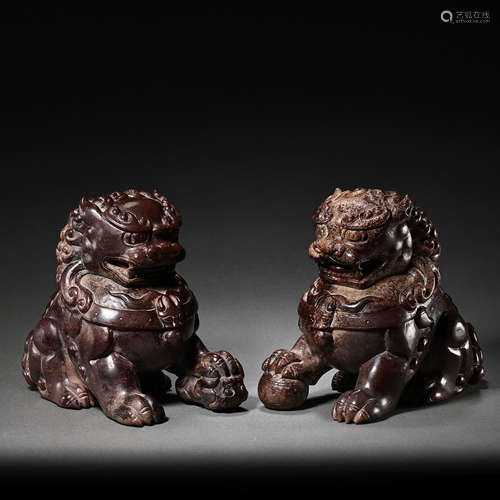 PAIR OF CHINESE QING DYNASTY HETIAN JADE LIONS