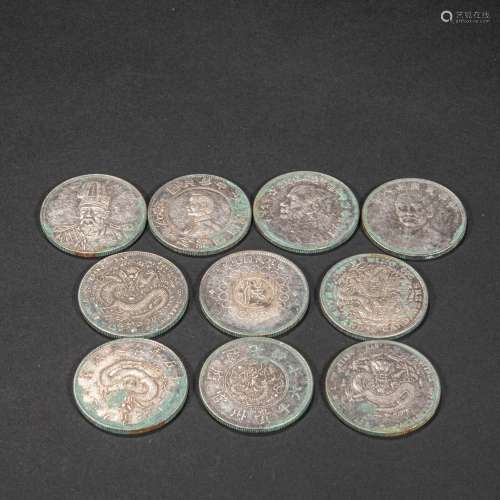 A GROUP OF CHINESE SILVER COINS