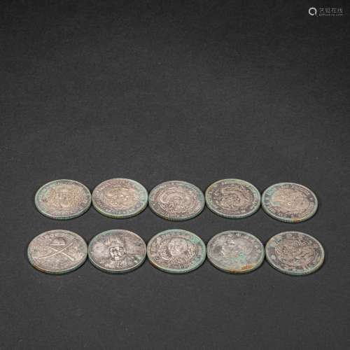 A SET OF CHINESE SILVER COINS