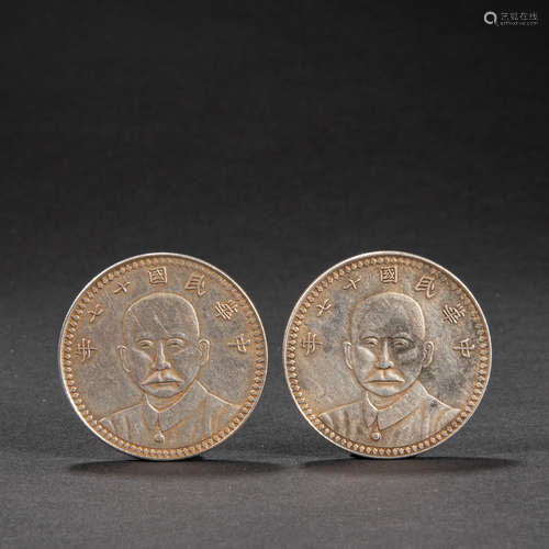 A PAIR OF CHINESE SILVER COINS