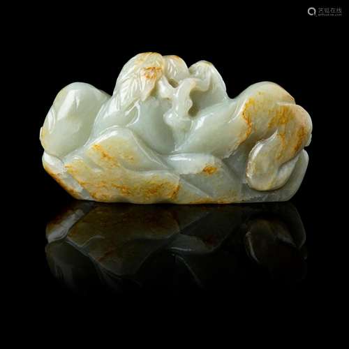 CELADON WITH RUSSET SKIN JADE 'MOUNTAIN' BRUSH REST QING DYN...