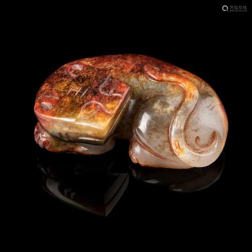 WHITE JADE WITH RUSSET SKIN CARVING OF A TIGER LIAO OR JIN D...