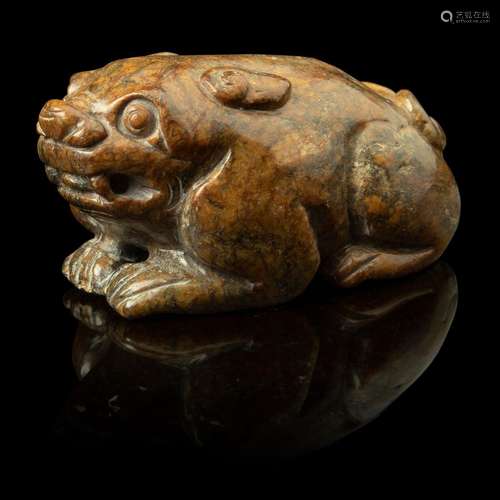 RUSSET JADE CARVING OF A MYTHICAL ANIMAL YUAN TO MING DYNAST...