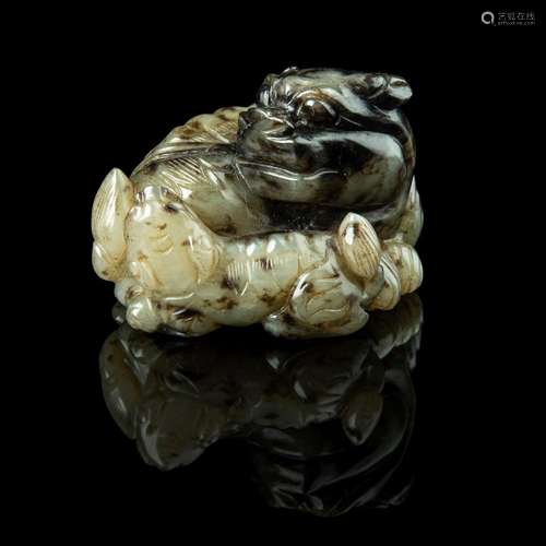 PALE CELADON JADE CARVING OF A QILIN AND CUB MING TO QING DY...