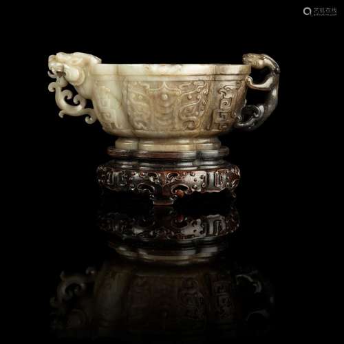 WHITE AND RUSSET JADE 'TAOTIE' CUP WITH DRAGON AND CHILONG H...