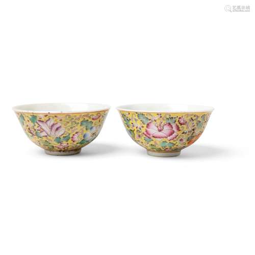 PAIR OF YELLOW-GROUND FAMILLE ROSE 'FLOWER' CUPS QING DYNAST...