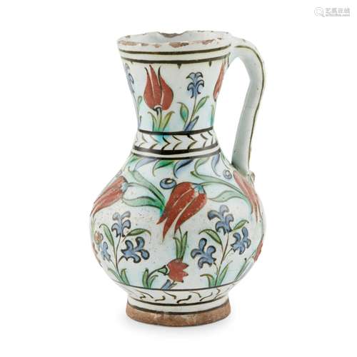 AN IZNIK POTTERY JUG WITH TULIPS AND HYACINTHS OTTOMAN TURKE...