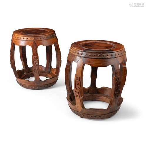 PAIR OF HUANGHUALI AND HARDWOOD CARVED DRUM FORM STOOLS QING...