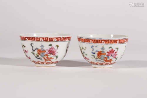 Pair of Famille Rose Eight Emblems Cups