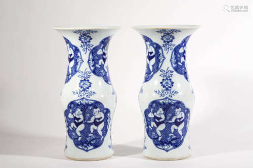 Pair of Blue and White Enclosing Boy Bottle Vases