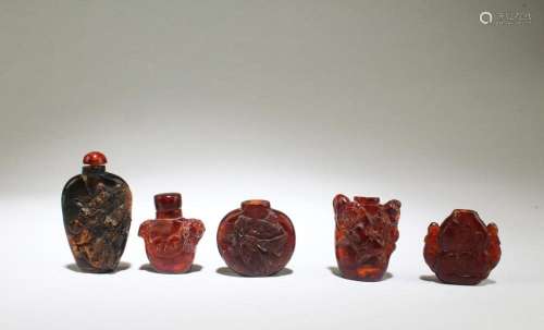 A Group of Five Amber Snuff Bottles