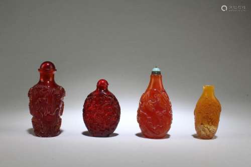 A Group of Four Snuff Bottles