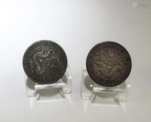 A Group of Two Chinese Silver Coins