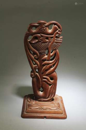 A Carved Wooden Display Ornament