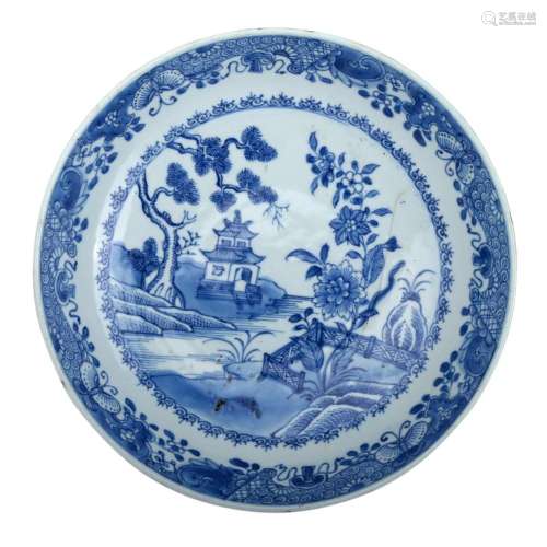 A BLUE AND WHITE 'FIGURES IN LANDSCAPE' DISH
