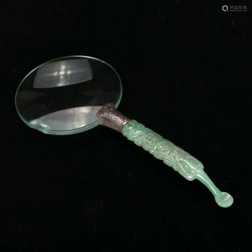 A CARVED JADEITE-HANDLED READING GLASS