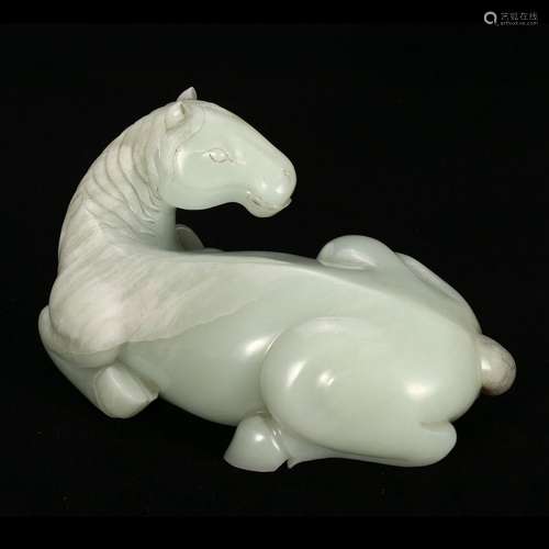 A WHITE JADE RECUMBENT HORSE