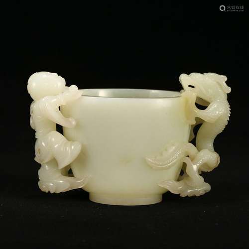 A WHITE JADE CUP WITH BEAST-FORMED HANDLES