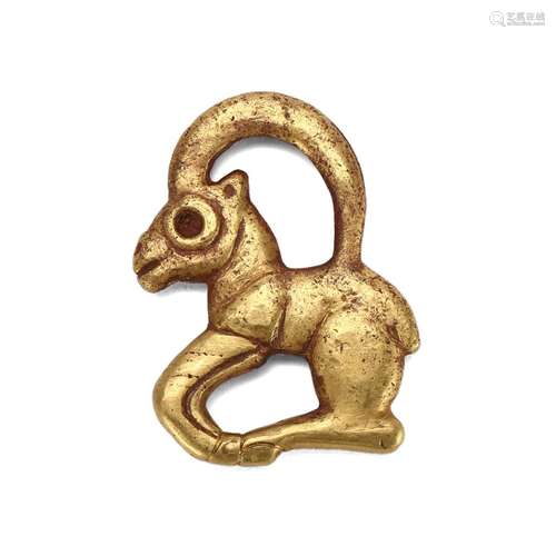 A SOLID GOLD GOAT ORNAMENT