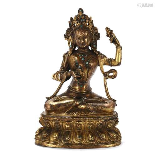 A GILT-BRONZE FIGURE OF SEATED TARA