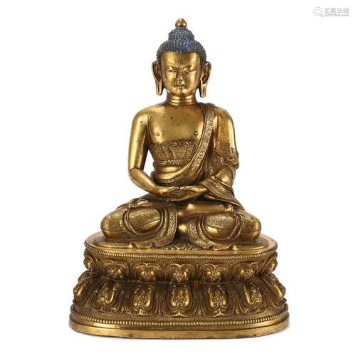 A GILT-BRONZE FIGURE OF SEATED SHAKYAMUNI