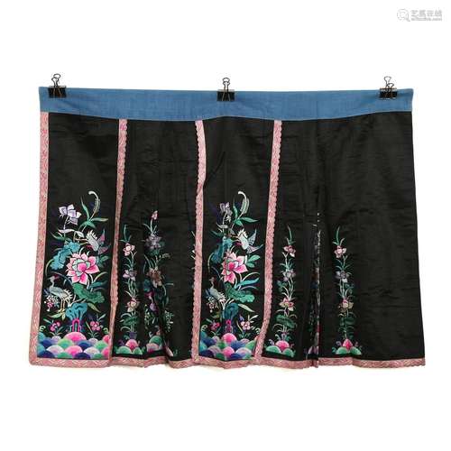 A BLACK GROUND EMBROIDERED FLORAL SKIRT