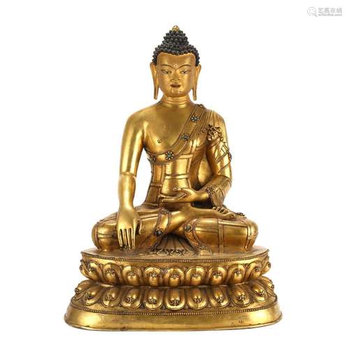 A GILT-BRONZE FIGURE OF SHAKYAMUNI