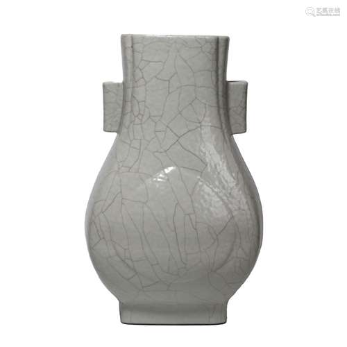 A WHITE-GLAZED VASE WITH HANDLES