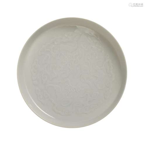 A WHITE-GLAZED FLORAL DISH