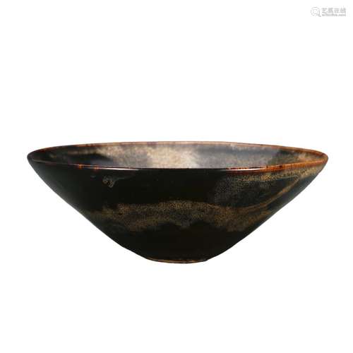 A BROWN-GLAZED BOWL