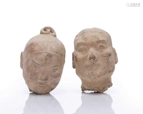 Two clay heads