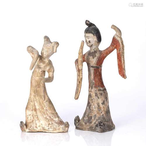 Two pottery figures of female dancers
