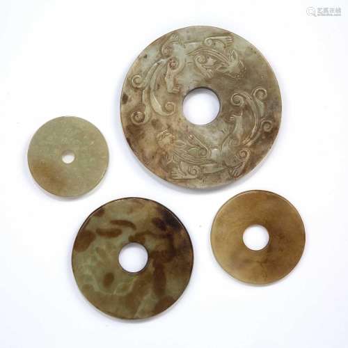 Four carved jade Bi discs