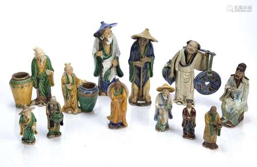 Group of twelve glazed scholars and other figures