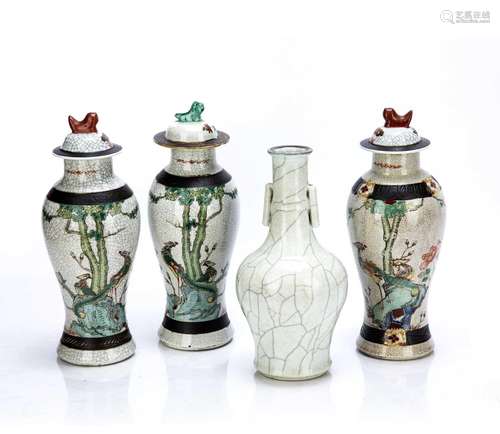 Garniture of three crackleware vases and covers