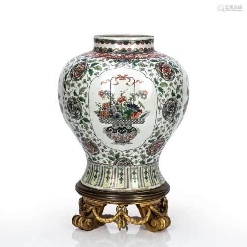 Famille verte porcelain baluster vase with an ormolu stand