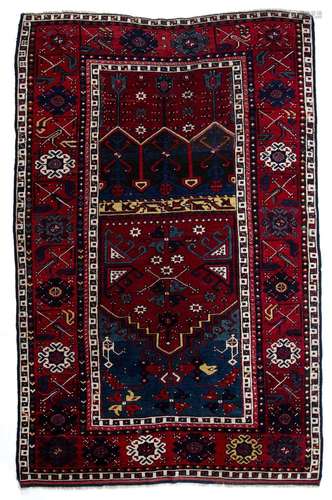 Red and blue ground prayer rug