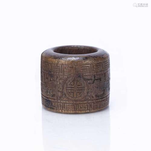 Carved wooden archers ring