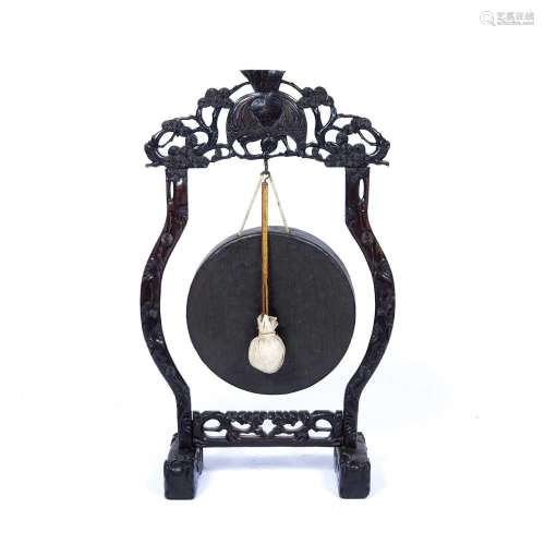 Carved hardwood gong stand with bronze gong