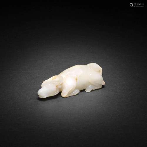 A WHITE JADE CARVING OF AN OX AND BOY 17th century