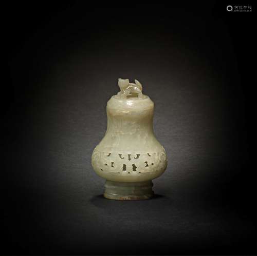 A PALE GREEN JADE RETICULATED VASE AND COVER Ming Dynasty (2...